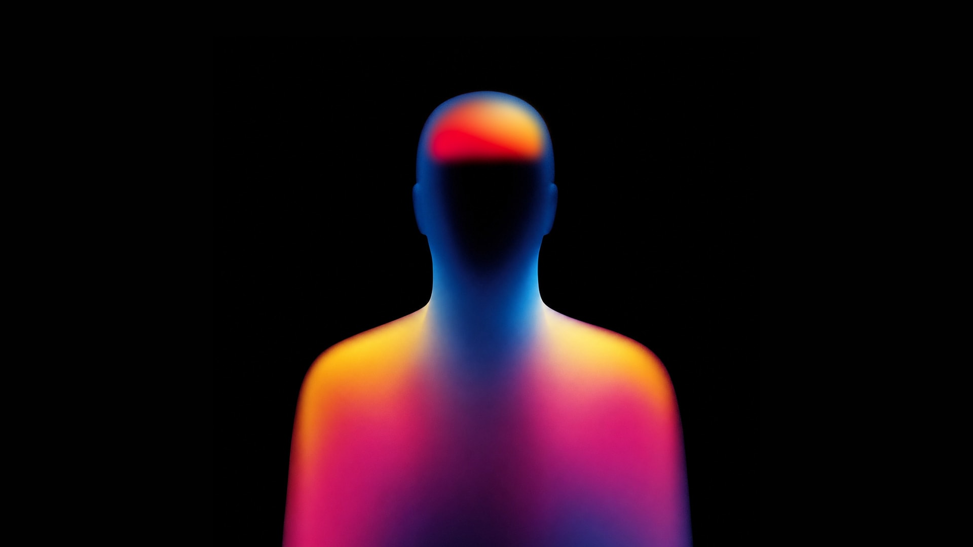 A thermal silhouette of a person with one region of the brain glowing red and amber